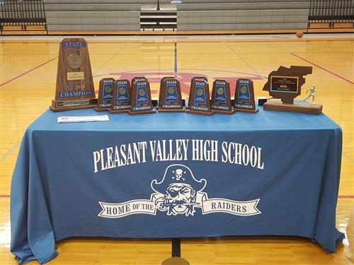 State Champion Trophy Table for Pleasant Valley High School Boys Cross Country 
